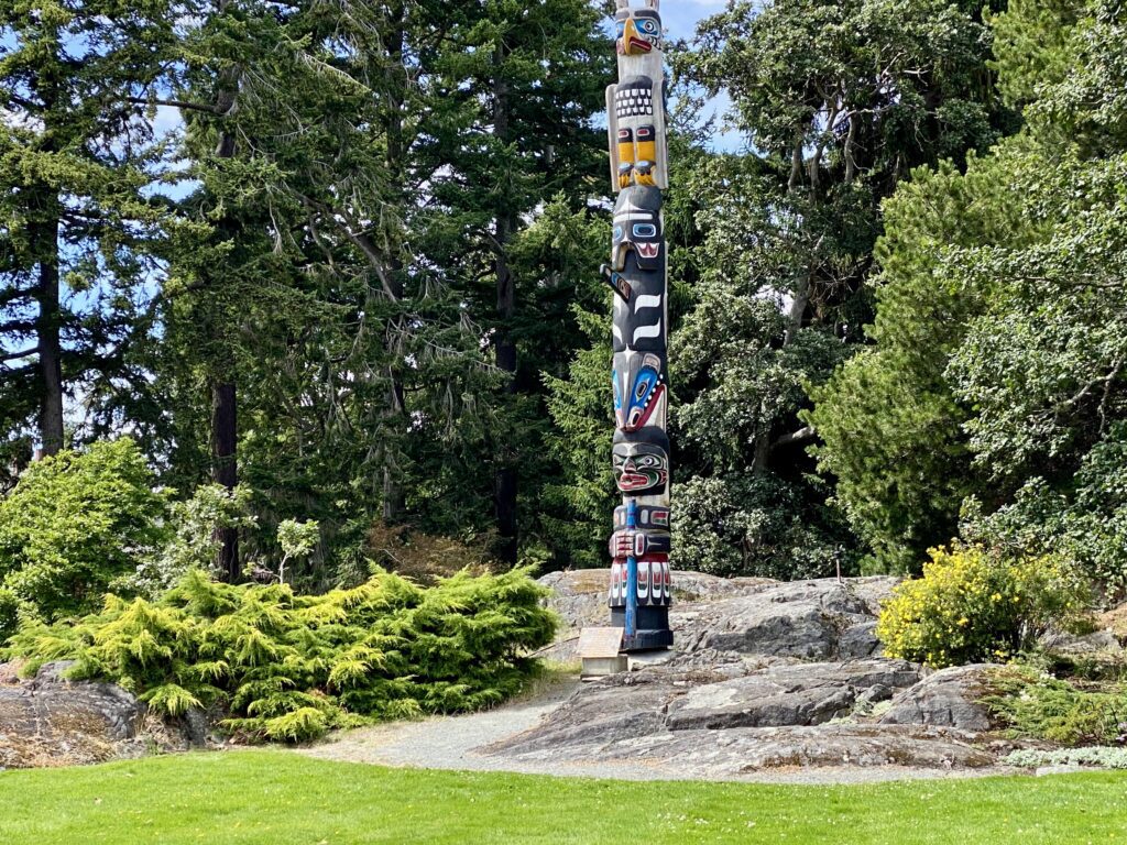 Totem poles carved from Western Red Ceder